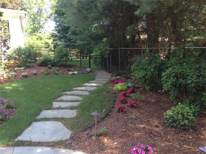 Retaining Wall, Steps, Walkway, Landscape Lighting, Planting Enhancements 