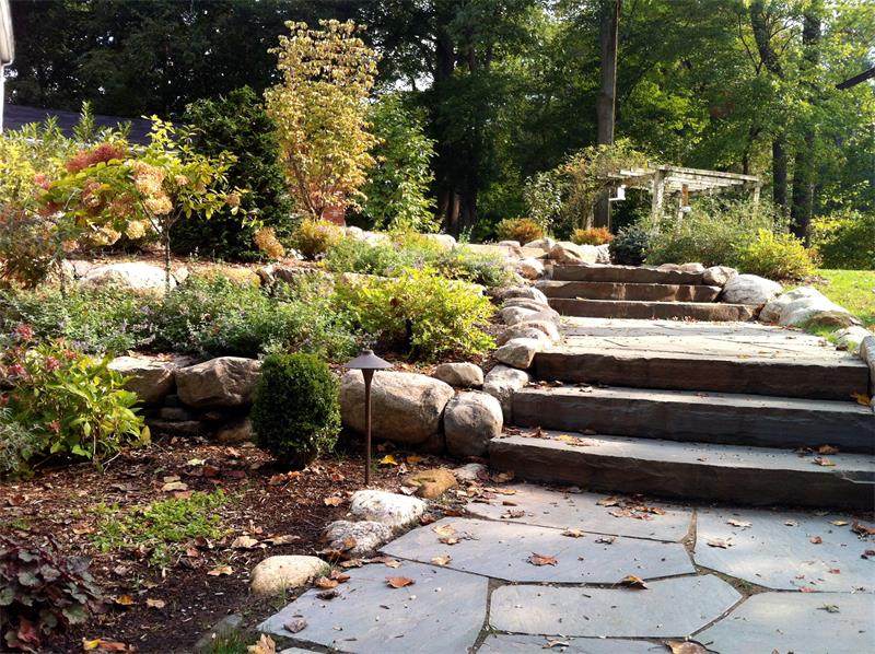 Retaining Wall, Steps, Walkway, Landscape Lighting, Planting Enhancements 